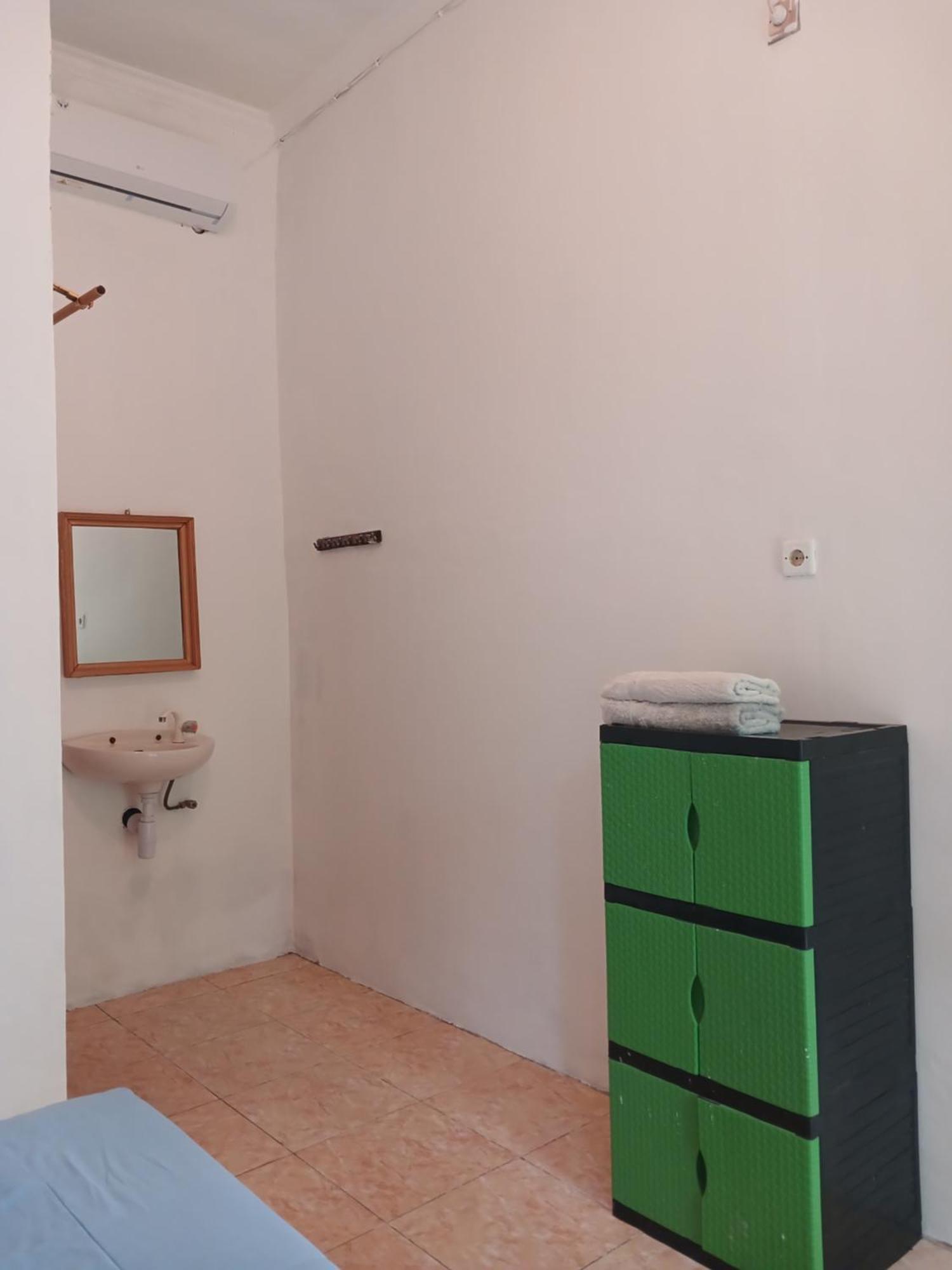 Roby Homestay Kuta  Номер фото