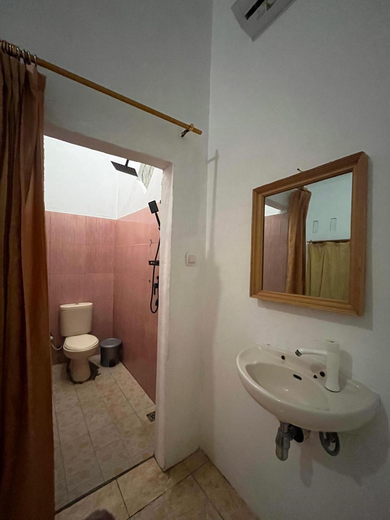 Roby Homestay Kuta  Номер фото